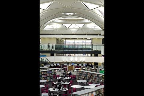 The school library occupies top deck of the island at the heart of concourse